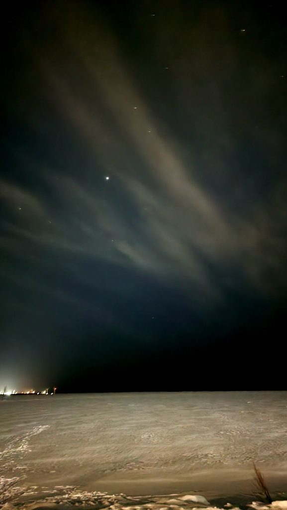 Noorderlicht vanuit de Seaside glass villas in Kemi, Finland